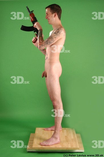 Whole Body Man Pose with pistol White Tattoo Nude Underweight Male Studio Poses