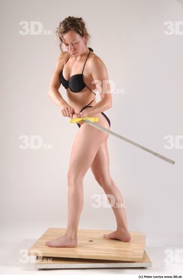 Whole Body Woman Pose with sword Underwear Muscular Studio photo references