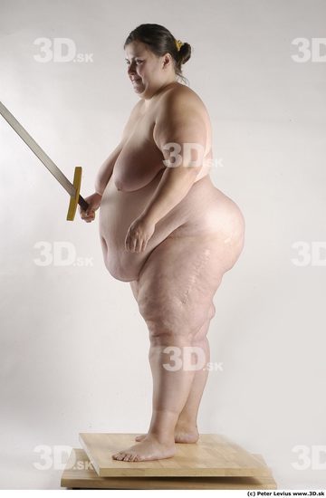 Whole Body Woman Pose with sword Nude Overweight Studio photo references