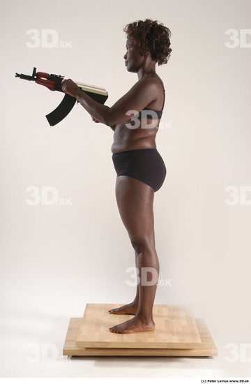 Whole Body Woman Pose with machine rifle Black Underwear Chubby