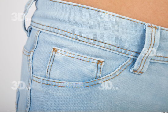 Pelvis blue jeans detail of Molly