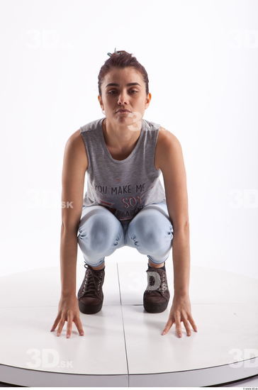 Kneeling photo references of Molly blue jeans womna singlet