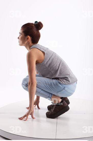 Kneeling photo references of Molly blue jeans womna singlet