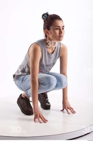 Kneeling photo references of Molly blue jeans womna singlet