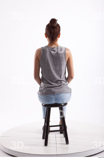 Sitting photo references of Molly blue jeans womna singlet