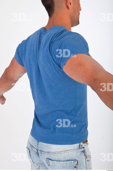 Upper body blue tshirt photo reference of Regelio