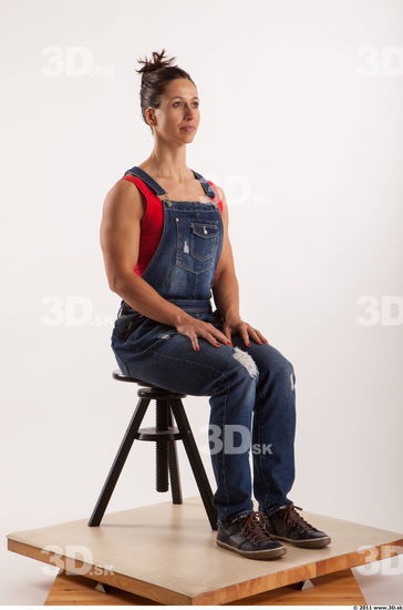 Sitting pose blue jeans red singlet of Rebecca