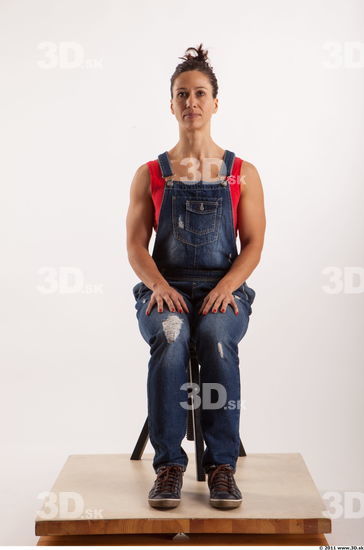 Sitting pose blue jeans red singlet of Rebecca