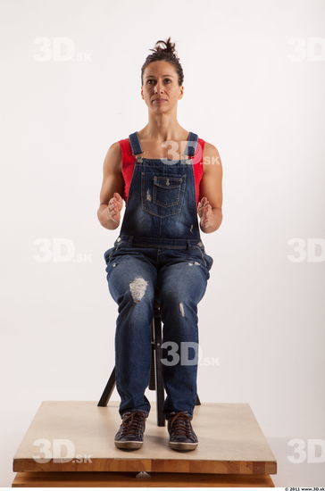 Sitting pose blue jeans red singlet of Rebecca