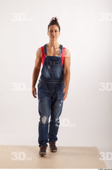 Walking pose blue jeans red singlet of Rebecca