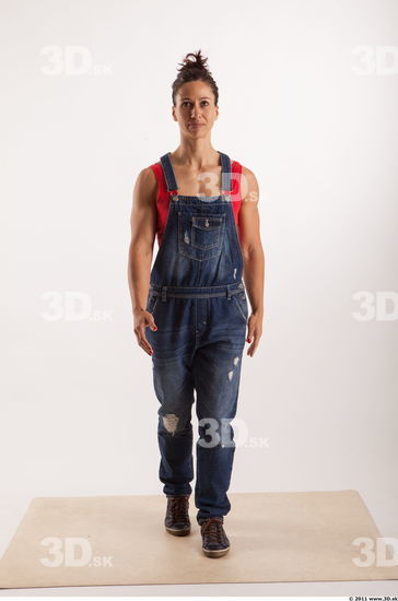 Walking pose blue jeans red singlet of Rebecca