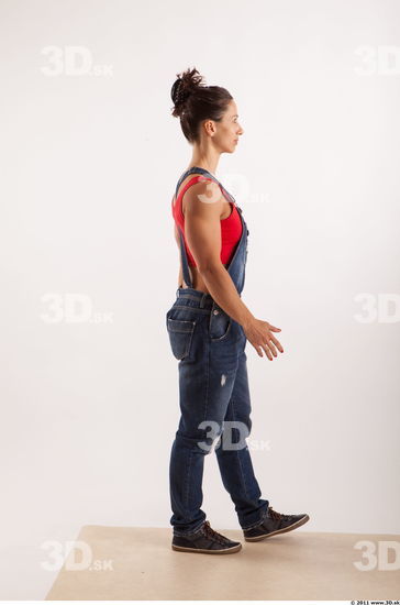 Walking pose blue jeans red singlet of Rebecca