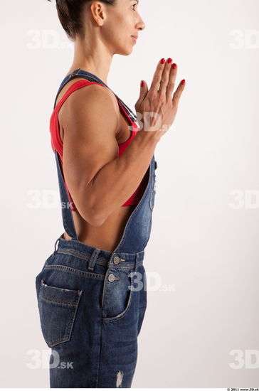 Arm moving blue jeans red singlet of Rebecca