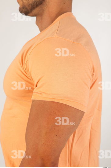 Upper body orange tshirt of Harold