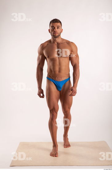 Walking pose light of bodybuilder Harold