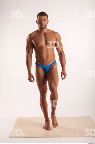 Walking pose light of bodybuilder Harold