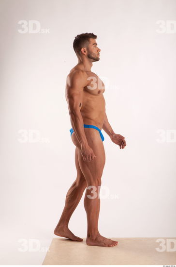 Walking pose light of bodybuilder Harold