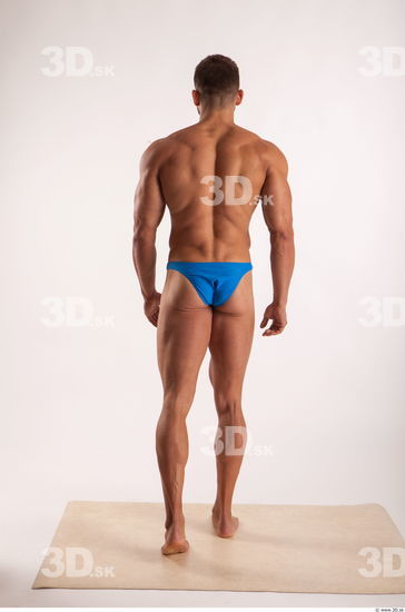 Walking pose light of bodybuilder Harold