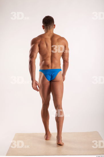 Walking pose light of bodybuilder Harold