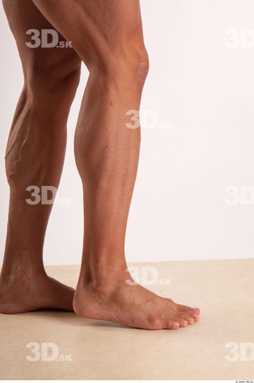 Calf moving pose light of bodybuilder Harold