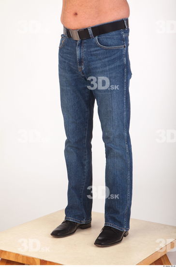 Leg deep blue jeans of Ed