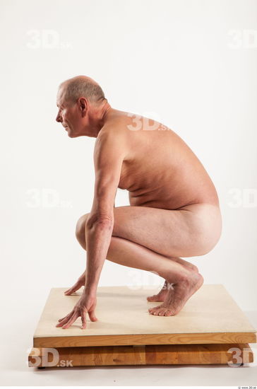 Kneeling pose of nude Ed