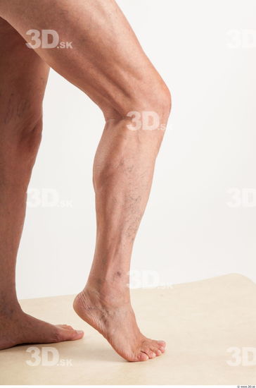 Calf moving pose of nude Ed