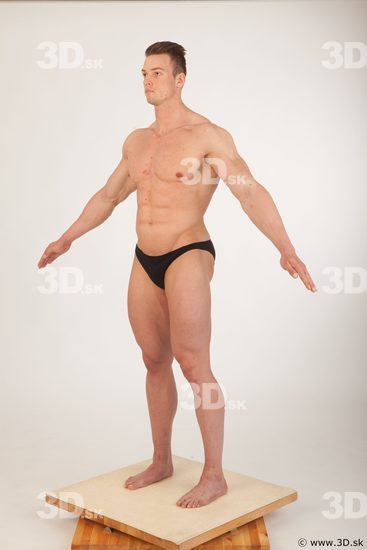 Whole body bodybuilder modeling pose of Andrew