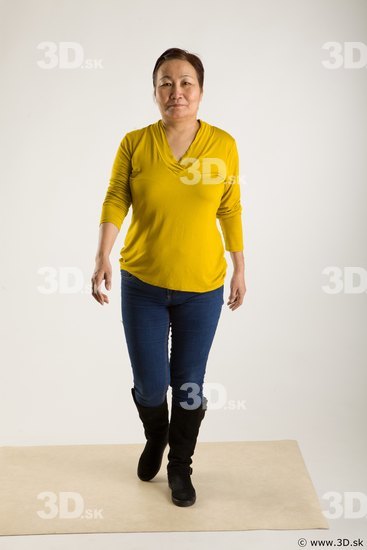 Walking reference of yellow sweater blue jeans Gwendolyn