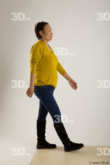 Walking reference of yellow sweater blue jeans Gwendolyn