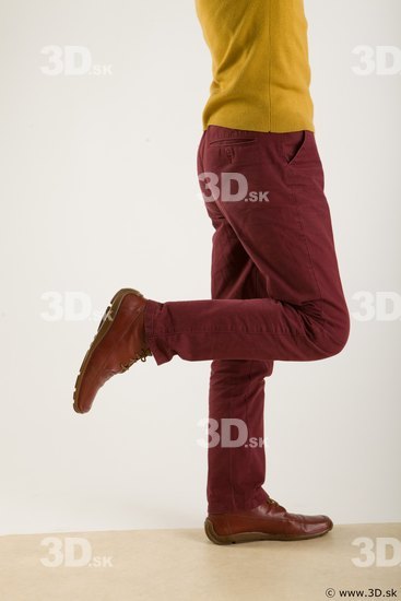 Leg flexing reference of yellow sweater red trousers Sidney