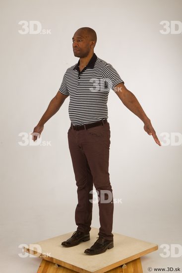 Whole body black white striped shirt brown jeans brown shoes of Arturo