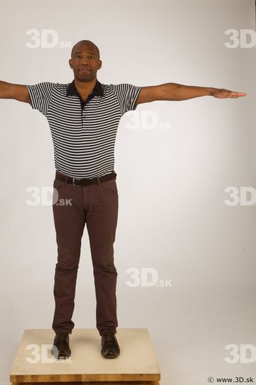 Whole body black white striped shirt brown jeans brown shoes modeling t pose of Arturo