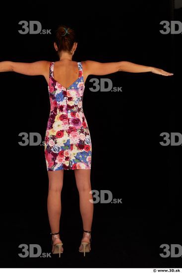 Whole body colored dress white heels modeling t pose of Little Caprice