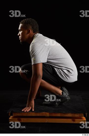 Whole Body Man Black Average Kneeling Studio photo references