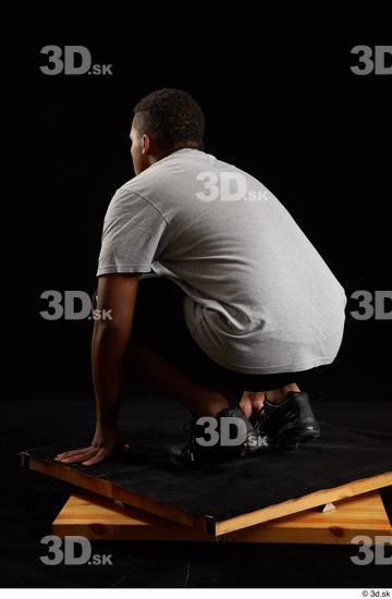 Whole Body Man Black Average Kneeling Studio photo references