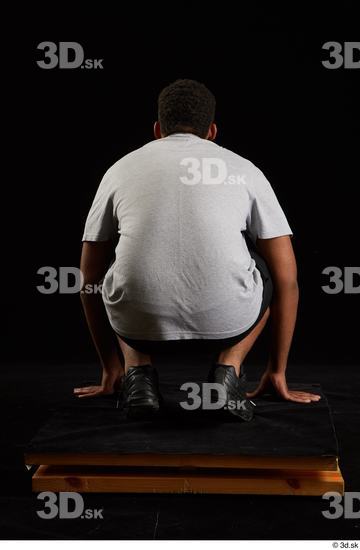 Whole Body Man Black Average Kneeling Studio photo references