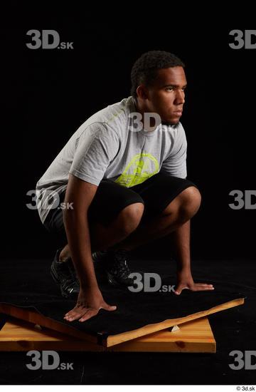 Whole Body Man Black Average Kneeling Studio photo references