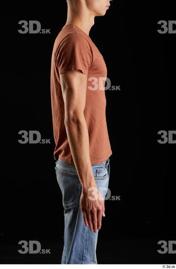 Alessandro Katz  arm brown t shirt casual dressed flexing side view  jpg