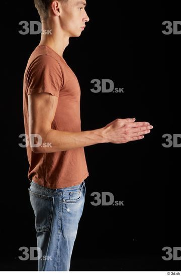 Alessandro Katz  arm brown t shirt casual dressed flexing side view  jpg