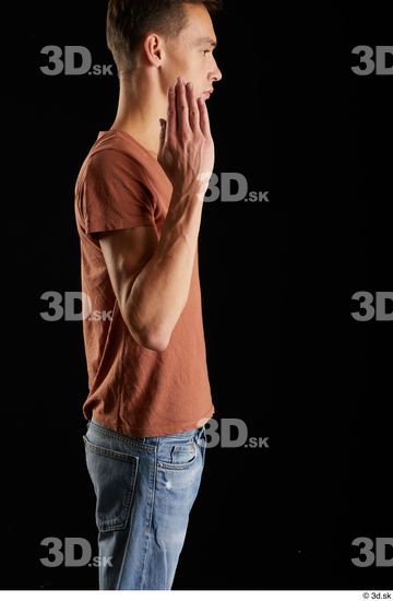 Alessandro Katz  arm brown t shirt casual dressed flexing side view  jpg