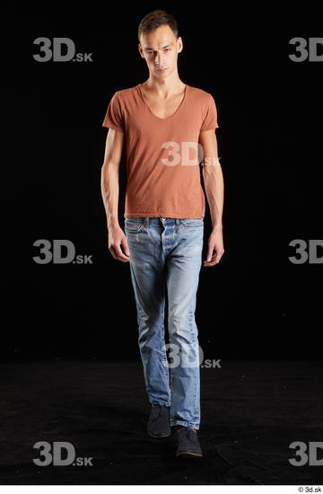 Alessandro Katz  black shoes blue jeans brown t shirt casual dressed front view walking whole body  jpg