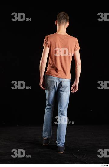 Alessandro Katz  back view black shoes blue jeans brown t shirt casual dressed walking whole body  jpg