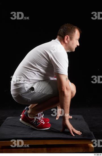 Whole Body Man White Sports Shirt Shorts Chubby Kneeling Studio photo references