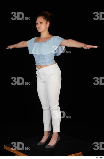 Serina Gomez blue carmen shirt casual grey high heels standing t poses white trousers whole body  jpg