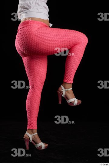 Leticia  casual dressed flexing leg pink leggings side view white sandals  jpg