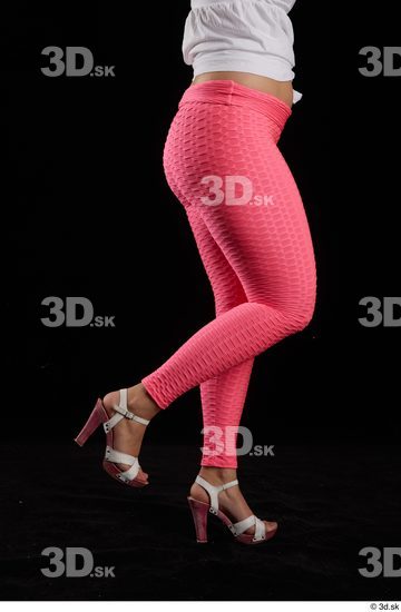 Leticia  casual dressed flexing leg pink leggings side view white sandals  jpg