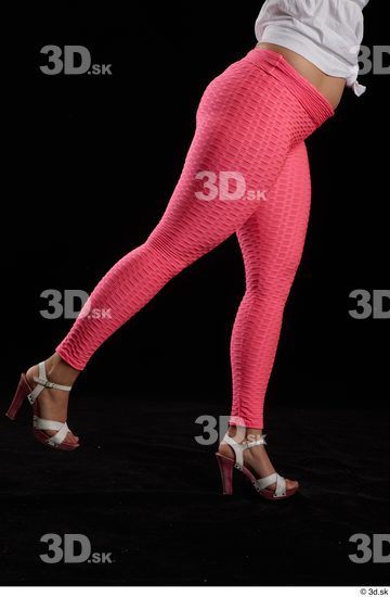 Leticia  casual dressed flexing leg pink leggings side view white sandals  jpg