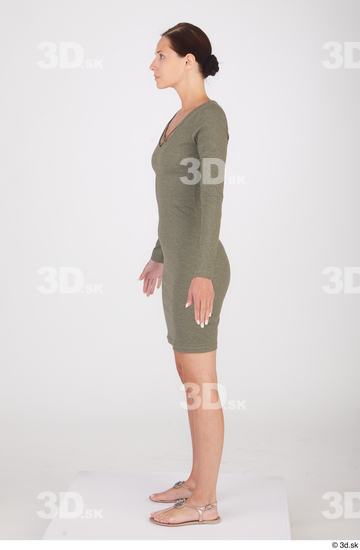 Vanessa Angel dressed green long sleeve dress standing whole body  jpg