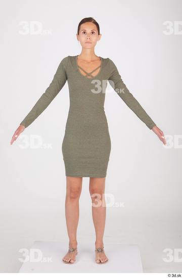 Vanessa Angel A poses dressed green long sleeve dress standing whole body  jpg